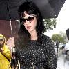 Katy Perry
holds her umbrella while leaving Cravings restaurant in Los Feliz after having lunch with a friend.