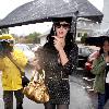 Katy Perry
holds her umbrella while leaving Cravings restaurant in Los Feliz after having lunch with a friend.