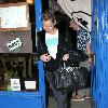 Kate Moss leaves a Japanese restaurant.