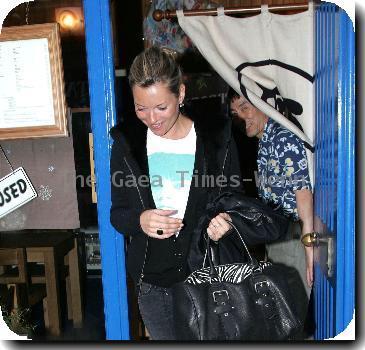 Kate Moss leaves a Japanese restaurant.