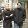 Michael Biehn out and about in Beverly Hills wearing a beiny hat in the rain walking with Jennifer BlancLos Angeles.