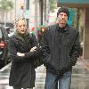 Michael Biehn out and about in Beverly Hills wearing a beiny hat in the rain walking with Jennifer BlancLos Angeles.