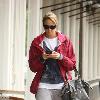 Stacy Keibler texting on her cellphone as she arrives at Starbucks for coffee in Hollywood Los Angeles.