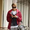 Stacy Keibler texting on her cellphone as she arrives at Starbucks for coffee in Hollywood Los Angeles.