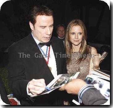 John Travolta and wife Kelly Preston 
arrive at the Berverly Hilton for the Los Angeles 'Hope for Haiti Now: A Global Benefit for Earthquake Relief' afterparty.