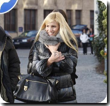 Michelle Hunziker leaving Bayerischer Hof hotel on her way to rehearsals of German TV show 'Wetten Dass...'. Lindau.