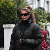 Elle Macpherson 
returning from dropping her son off at school.