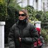 Elle Macpherson 
returning from dropping her son off at school.