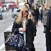 Fearne Cotton 
talks on her mobile phone whilst out grabbing some lunch.