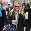 Fearne Cotton 
talks on her mobile phone whilst out grabbing some lunch.