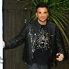 Peter Andre 
leaves his house.