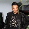 Peter Andre 
leaves his house.