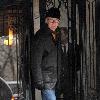 John Lithgow 
departs his Manhattan residence.