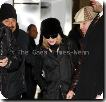 Madonna 
arriving at JFK airport.