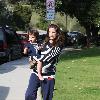 Amanda Peet and daughter Frances Penpregnant at the Coldwater Park and making funny faces as she carries her daughter to her carBeverly Hills.