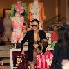 Miranda Kerr 
shopping at Victoria Secrets with her dog..