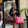 Miranda Kerr 
shopping at Victoria Secrets with her dog..