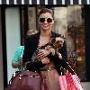 Miranda Kerr 
shopping at Victoria Secrets with her dog..