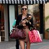 Miranda Kerr 
shopping at Victoria Secrets with her dog..