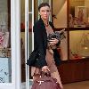 Miranda Kerr 
shopping at Victoria Secrets with her dog..