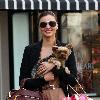 Miranda Kerr 
shopping at Victoria Secrets with her dog..