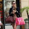 Miranda Kerr 
shopping at Victoria Secrets with her dog..