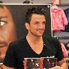 Peter Andre 
promotes and signs copies of his new CD 'Unconditional Love Songs' at Tesco..