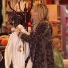 Lisa Gastineauout shopping with her daughter at the 'Under G's Lingerie' boutique in Beverly Hills.Los Angeles.