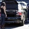 Vanessa Hudgens returning to her car after shopping, to find it has a flat tire. Los Angeles.