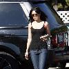 Vanessa Hudgens returning to her car after shopping, to find it has a flat tire. Los Angeles.