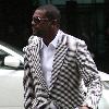 Chris Tucker 
seen leaving a bank while out shopping in Beverly Hills..