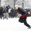 Hundreds of people turn up at Dupont Circle for a giant snowball fight, organized through the social networking website Facebook
in Washington DC, on 6th January 2009..