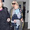 Zuma Rossdale arrives at LAX airport with his mom. Los Angeles.