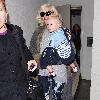 Zuma Rossdale arrives at LAX airport with his mom. Los Angeles.