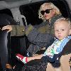 Zuma Rossdale arrives at LAX airport with his mom. Los Angeles.