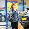 Chanelle Hayes walks back to her car after doing some shopping at Sainsbury's. Yorkshire.