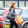 Chanelle Hayes walks back to her car after doing some shopping at Sainsbury's. Yorkshire.