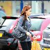 Chanelle Hayes walks back to her car after doing some shopping at Sainsbury's. Yorkshire.