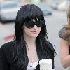 Ashlee Simpson-Wentz enjoying coffee as she leaves Ken Paves Salon after getting a haircut. Los Angeles.