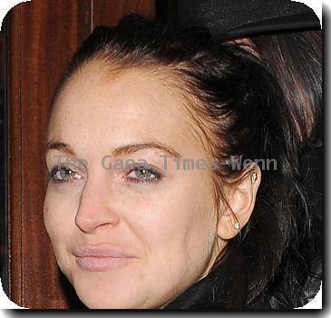 Lindsay Lohan arrives back at her hotel just after 4.30am after a night out at a nearby club. Lindsay was in a cheerful mood, despite being locked out of her hotel! After a few loud bangs on the door, her group were finally let in!
London, England.