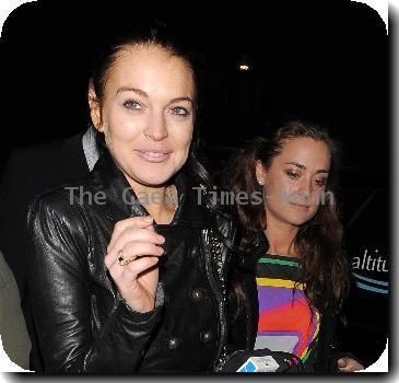 Lindsay Lohan arrives back at her hotel just after 4.30am after a night out at a nearby club. Lindsay was in a cheerful mood, despite being locked out of her hotel! After a few loud bangs on the door, her group were finally let in!
London, England.