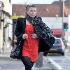 Coleen Rooney returns to her car after shopping at United Colors of Benetton Liverpool.