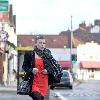 Coleen Rooney returns to her car after shopping at United Colors of Benetton Liverpool.