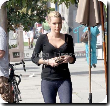 Sophie Monk walking in Hollywood with a foot cast after her recent car accident in Marina del Rey. She is also wearing a back brace and had much difficulty walking due to her injuries. Los Angeles.