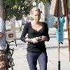 Sophie Monk walking in Hollywood with a foot cast after her recent car accident in Marina del Rey. She is also wearing a back brace and had much difficulty walking due to her injuries. Los Angeles.