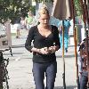 Sophie Monk walking in Hollywood with a foot cast after her recent car accident in Marina del Rey. She is also wearing a back brace and had much difficulty walking due to her injuries. Los Angeles.