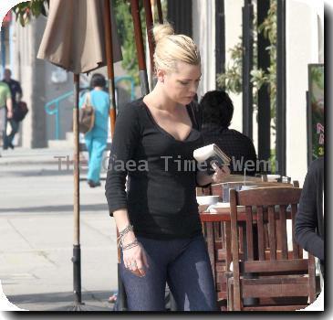 Sophie Monk walking in Hollywood with a foot cast after her recent car accident in Marina del Rey. She is also wearing a back brace and had much difficulty walking due to her injuries. Los Angeles.