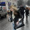 Fearne Cotton running to her car to avoid the rain after leaving the BBC Radio 1 studios London.