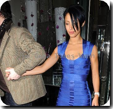 Amelle Berrabah of pop group the Sugababes leaves the Ivy club a bit worse for wear at 1:30 am with Michael Evans London.