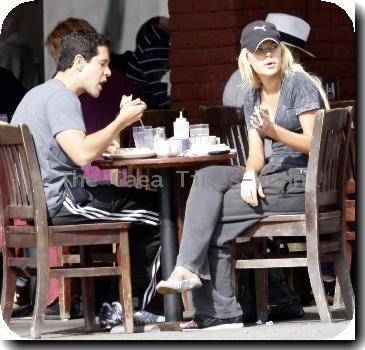 Sophie Monk talking in her mobile phone after putting out the trash near her home.A scar is visible on her right hip, as a result from a car accident earlier this year (10)Los Angeles.